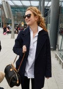 Lily James - flies out of Heathrow Airport to Tokyo 4/05/2015
